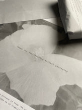 Flat wrapping paper in Black and White for CloudCloth multi pack options to show design. CloudCloths are soft organic cotton face cloths made in Britain. Perfect for gently removing makeup and other skincare products such as facial cleansers.  